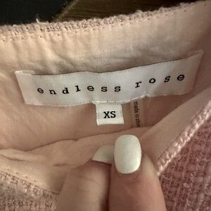 Endless Rose light pink tweed dress.